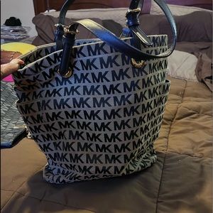 Authentic Micheal Kors black & grey